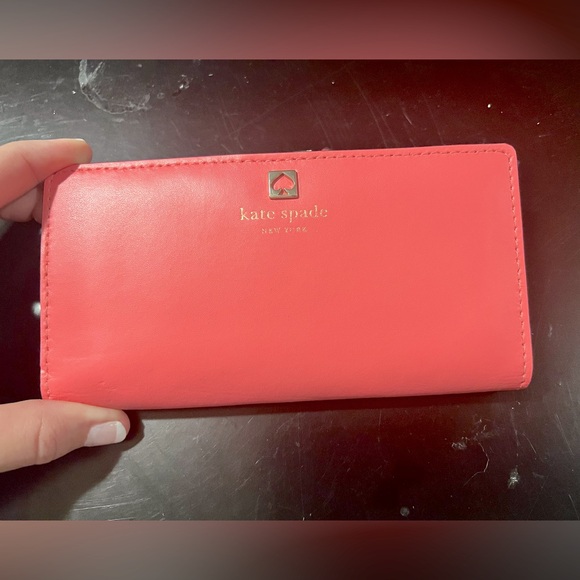 Kate Spade. Pink snap wallet. Some wear on inside. - Picture 1 of 3